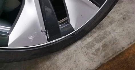 i scratched my tesla rim|tesla rim rash.